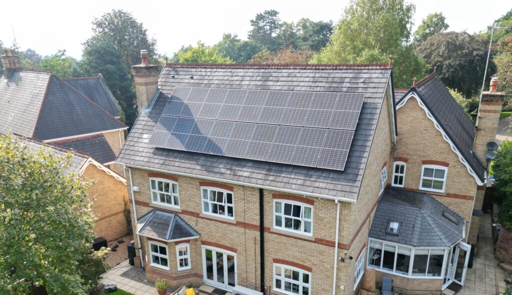 Aerial photograph of a domestic solar panel installation.